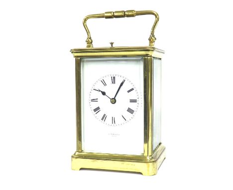 French repeater carriage clock striking on a gong, the dial plate signed J. Simmons, Paris, within a corniche brass case, 7" 