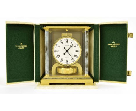 Jaeger LeCoultre Atmos clock, the 4.5" white dial within a grey marbled pillared stepped case with gadrooned borders, 9.5" hi