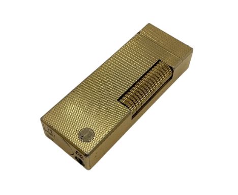 Dunhill gold plated lighter with engine turned decoration