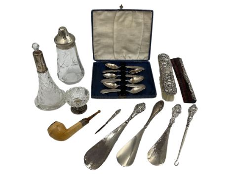 Group of silver mounted items, including cut glass sugar sifter with silver cover, cut glass dressing table bottle, shoe horn