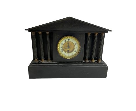 French - 19th-century timepiece mantle clock in a slate case with recessed columns. With pendulum and key.