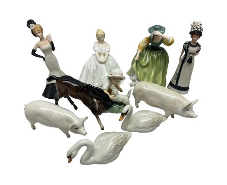 Group of figures, comprising Beswick CH. Wall Queen 40, Ch Wall Champion Boy 53, bay foal and two swans, together with Royal 