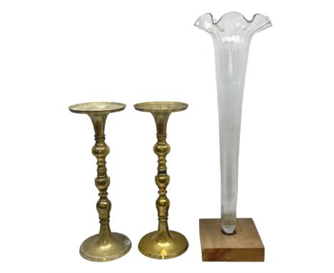 Pair of tall brass candlesticks, together with a tall clear glass vase with frilled rim, candlestick H50cm