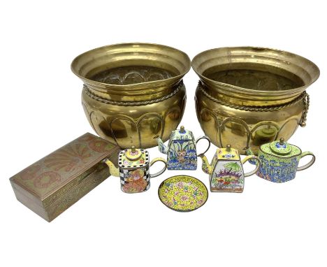 Pair of brass planters with twisted rope decoration, together with four cloisonn� style teapots decorated with polychrome ena