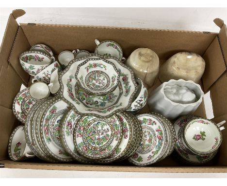 Three ceramic jelly moulds, one in the form of a lion, together with Coalport and similar Indian Tree pattern teawares, to in