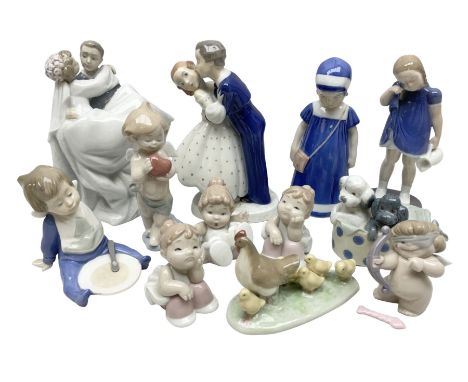 Royal Copenhagen figure group of couple kissing, together with to B &amp; G figures and nine Nao figures 