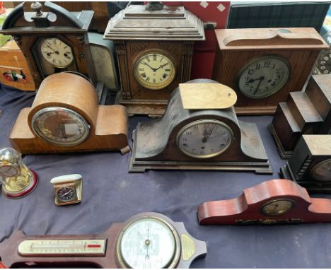 An oak cased Napoleon hat mantle clock together with a collection of mantle clocks and clock cases 
