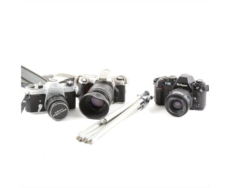 Cameras: Nikon F-501 camera; Nikon F-65 camera, with Sigma 70-210mm lens; Pentax Spotmatic F camer; video camera and accessor