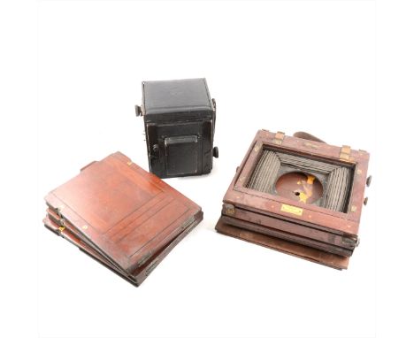 A Thornton Picard quarter plate box camera, circa 1930, original leather case, and various other early photographic whole pla