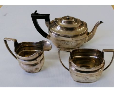 A George V three-piece silver tea service by George Nathan &amp; Ridley Hayes, Chester, 1912, 682g, knop missing, inscribed