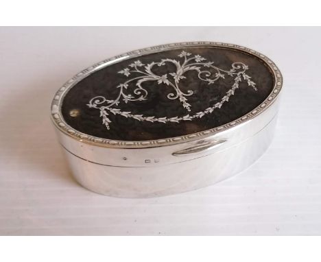 A George V silver and tortoiseshell oval trinket box with festoon inlay decoration, lined interior by Deakin &amp; Francis Lt