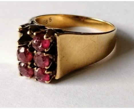 A mid-century yellow gold ring of tapering form with ruby decoration (one stone missing), size M, stamped 14k, 4.7g 