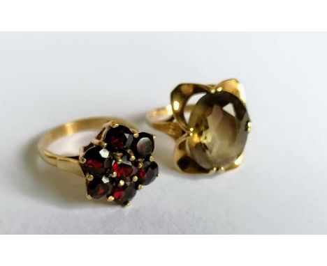 Two gem-set dress rings on 9ct yellow gold claw settings, sizes R, hallmarked, 10.5g (2) 
