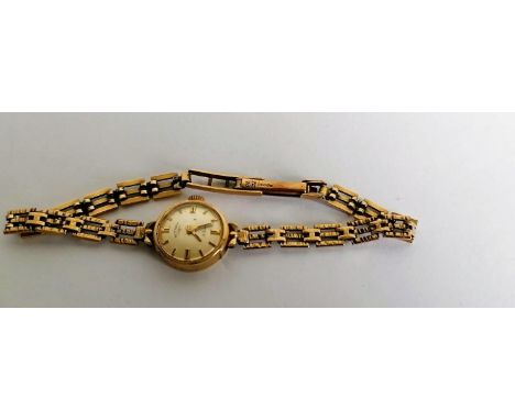 A mid-20th century ladies Rotary wristwatch with a 9ct gold case and strap, hallmarked, two spare links, in original box, not