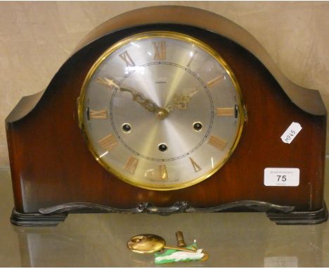 A Westminster chime manual wind mantle clock. 