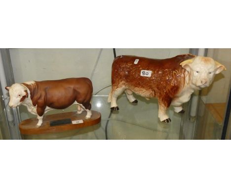 A Beswick pulled Hereford bull on a wooden base (Connoisseur collection) together with a Melba ware Hereford bull, 24 cm high