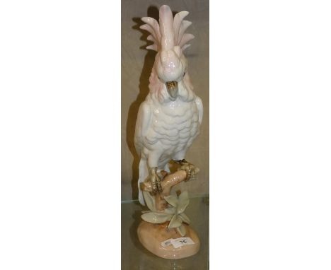 A Royal Dux ceramic model of a parakeet, 40 cm high.