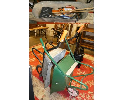 A Stihl HSE 52 hedge strimmer together with&nbsp; galvanised tin bath, hand tools and two wheelbarrows (3).