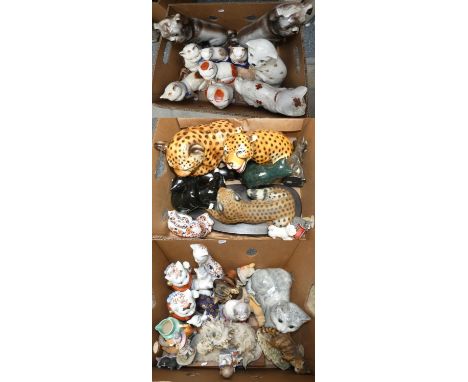 A large collection of mainly ceramic models of cats, including makers Nao, Staffordshire, 'Just Cats &amp; Co.' and others (3