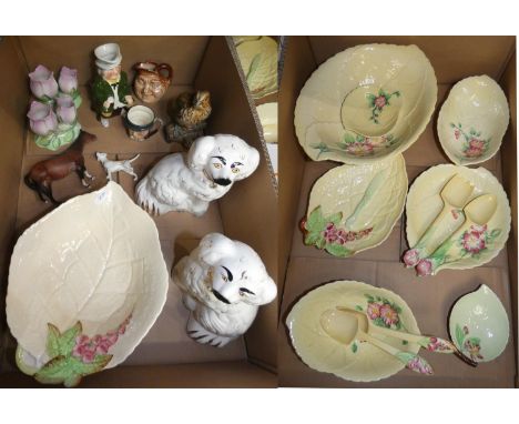 A collection of Carlton ware ceramics, a pair of Beswick ceramic dogs, horse, Sylvac and Doulton Toby jugs, etc. (2). 