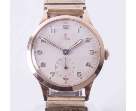 Tudor, a 9ct manual wind wristwatch circa 1965, the dial with Arabic numerals and sub-second dial, case diameter 32mm. The ba
