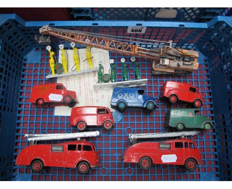 Two Dinky No 555 Fire Engines, complete with ladders and bells (good paint), three "Trojan" vans, a Dunlop Oxo and Chivers; t