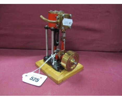 A Small Vertical Steam Engine, 5 inch high single cylinder with ½ inch stroke and 1½ inch solid brass flywheel, overall finis