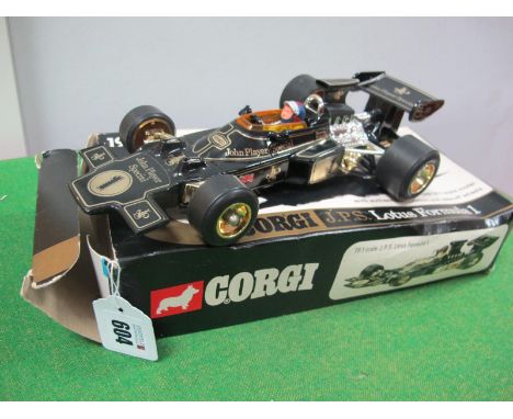 A Boxed Corgi No 190 Lotus Formula 1, J.P.S appears complete but wheel tool missing, box fair.