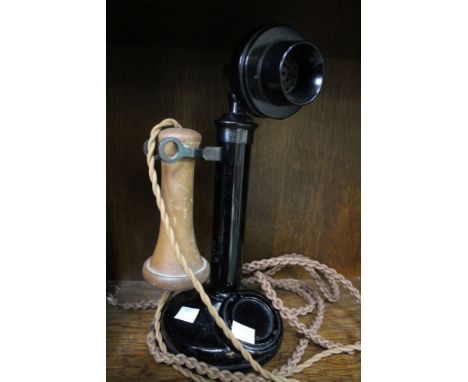 A traditional early stick telephone