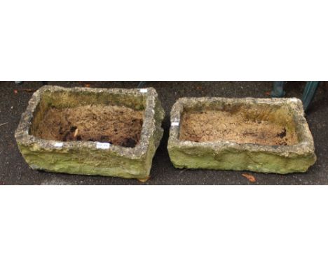 Two rough cast garden small trough planters