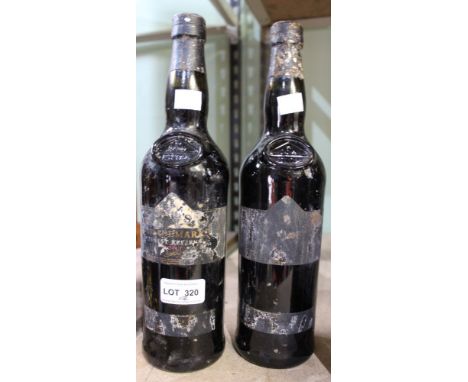 Two bottles of Dows Vintage Port, labels unclear