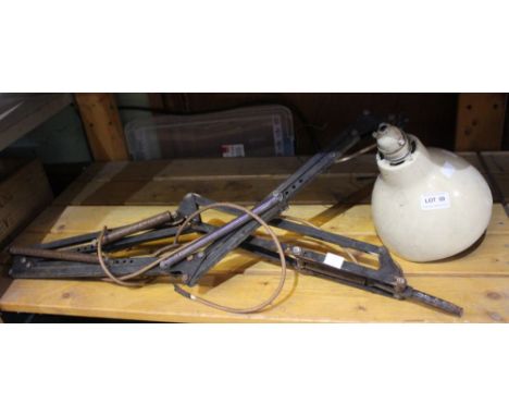 A vintage adjustable machinists lamp