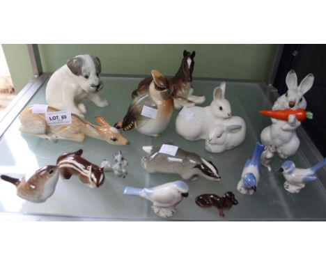 A shelf containing a good selection of USSR ceramic woodland animal figures (15)