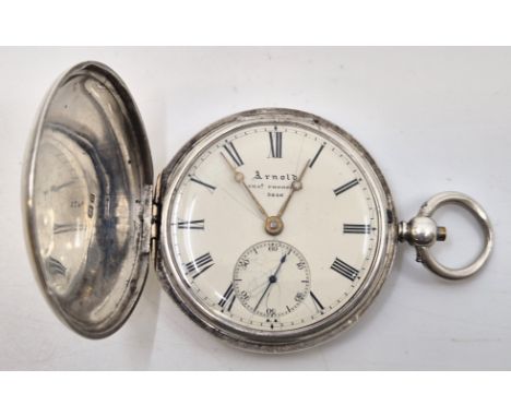 A Victorian Arnold Chas. Frodsham silver hunter pocket watch, key wind, having white enamel signed Roman numeral dial with ou