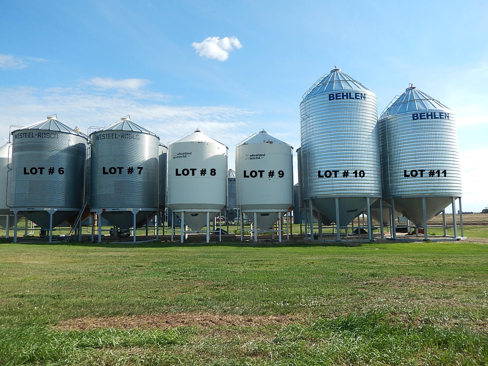 { Choice of lots 8,9 } Wheatland ±1500 bushel hopper bottom grain bin