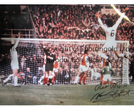 NORMAN HUNTER / LEEDS UNITED AUTOGRAPH          A 15" X 12" signed colour photograph of Norman Hunter celebration Leeds Unite