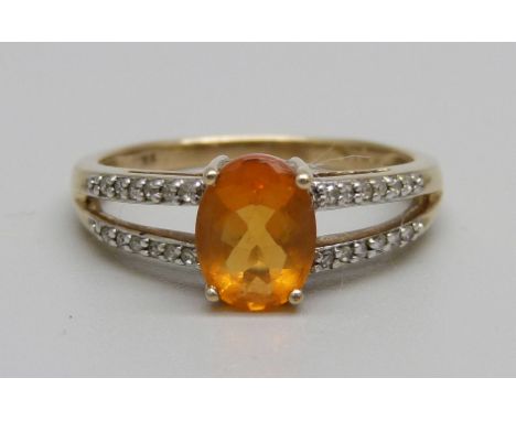 A 9ct gold, fire opal and diamond ring, 2.8g, P 