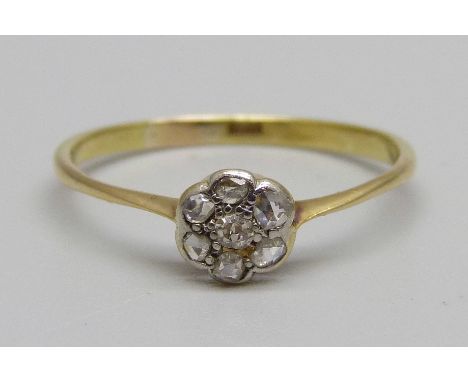 A 1920's 18ct gold and diamond cluster ring, 1.6g, R 