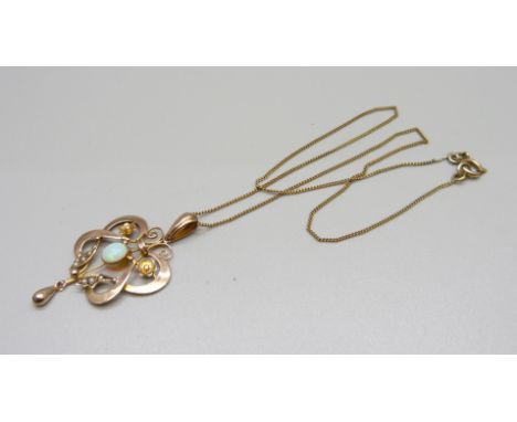 A vintage Art Nouveau 9ct gold and opal pendant and chain, 4.0g 