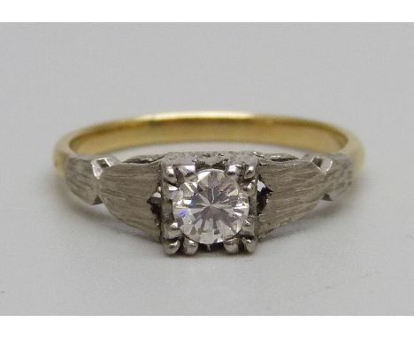 An 18ct gold diamond solitaire ring, 3.2g, M 