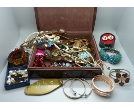 A box of costume jewellery, cufflinks and a Hollywood pill box, plus three gemstones, ruby, sapphire and emerald 