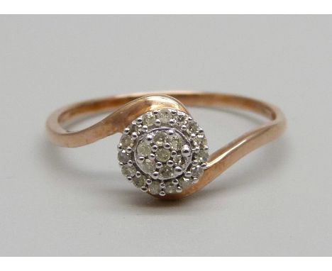 A 9ct rose gold, twenty-two diamond cluster ring, with certificate, 1.6g, U 