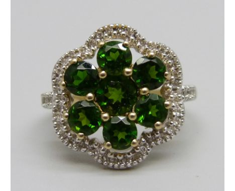 A 9ct gold, green diopside and thirty-eight stone diamond ring, 3.8g, P 