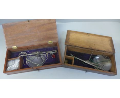 Two sets of cased sovereign scales 