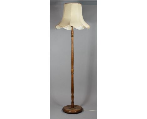 A Mid 20th Century Oak Standard Lamp with Slender Turned Support with Shade 