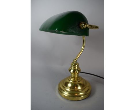 A Brass and Green Glass Mounted Clerks Desk Lamp, 37cms High 