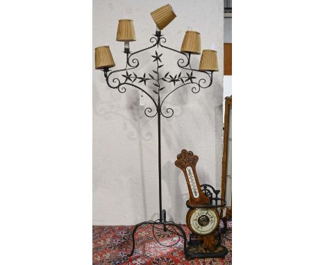 A wrought iron five branch standard lamp, 165cm h, a wrought iron stick stand and oak barometer  