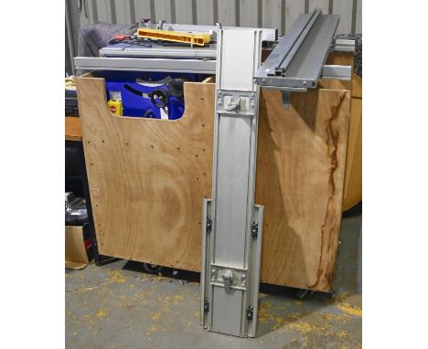 An Elektra Beckum table saw, mounted in plywood bench, 110 x 108cm  