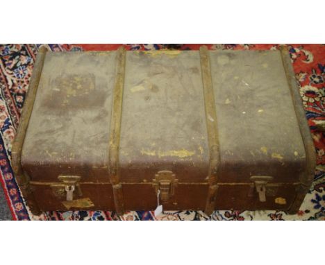 A wood bound travel trunk