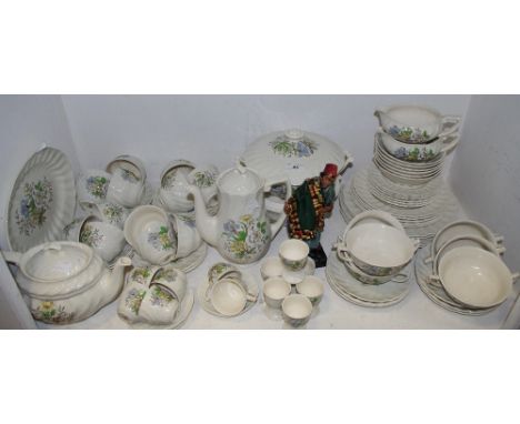 A Royal Doulton Sutherland pattern table setting comprising of coffee pot, six soup cups, teapot, egg cups, 6 cups and saucer